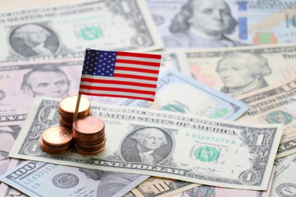 US flag and Dollar cash background, finance and economy concept