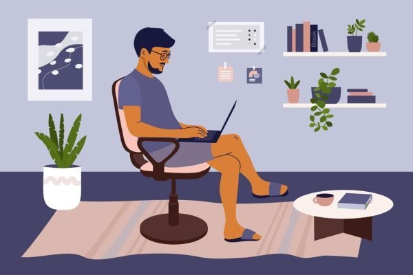 Man working on laptop from home in cozy interior