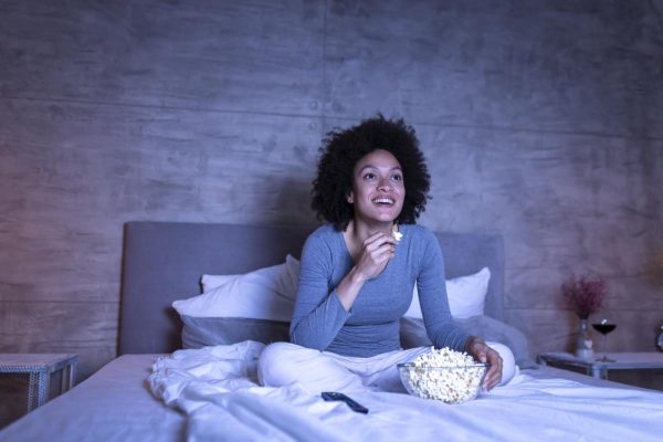 Woman watching comedy on TV