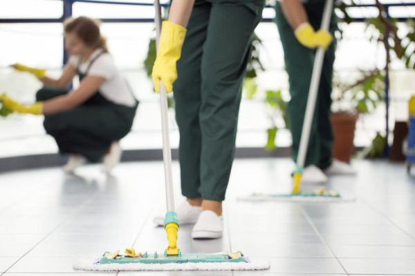 Person cleaning the floor