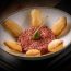 Conheça nosso Steak Tartare, um clássico culinário imperdível.Preparado com maestria, o Steak Ta